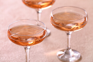 Glasses of tasty champagne on table