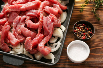 Ingredients for beef stroganoff on table