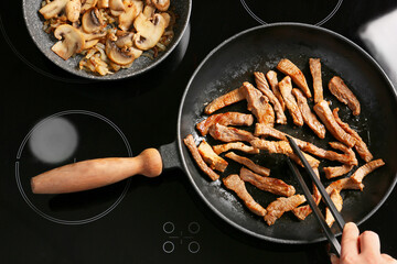 Woman cooking tasty beef stroganoff, top view