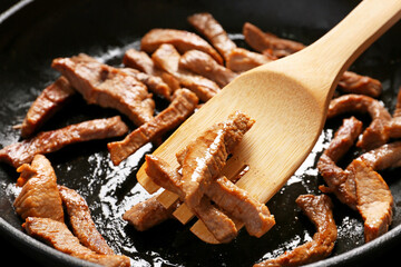 Cooking of tasty beef stroganoff, closeup