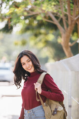 Obraz premium Happy woman student with backpack,Education concept