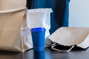 delivery service package cup bag box blue food open coffee to go