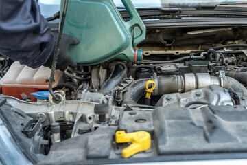 mechanic change oil to engine, car servicing