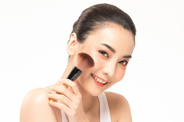 Beauty asian woman hold make up brush  and cheerful with make up brush