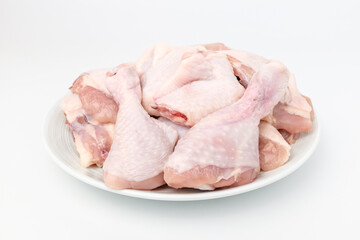 Raw chicken on white background