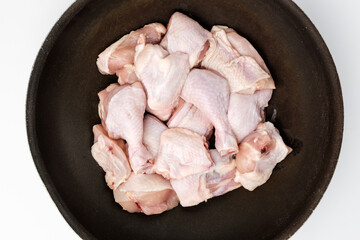 Raw chicken on white background