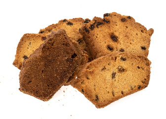 Raisin cake, dusted with icing sugar. Cupcake with raisins on white background