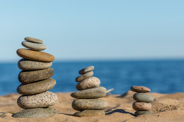Fototapeta na wymiar a stack of zen stones on beach