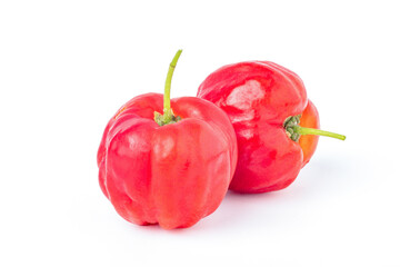 Two Acerola Cherries isolated on white background.