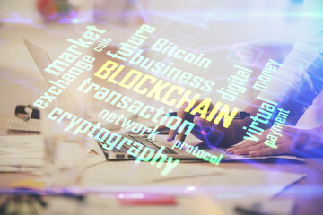 Double exposure of woman hands typing on computer and crypto market theme hologram drawing. Blockchain concept.