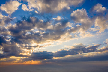 aerial Autumn landscape. Fog in mountains in the morning. Sun illuminated foggy spring hills. Colorful sky. Green trees.
