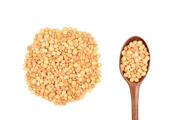 Wooden spoon and peas on an isolated background