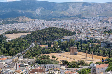 Fototapeta na wymiar Olympian Zeus temple and Panathenaic ancient stadium in Athens, view from Acropolis hill. Attica, Greece