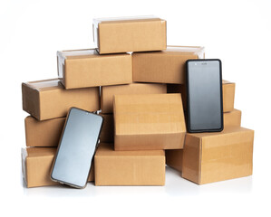 Stack of cardboard boxes for delivery with smartphone isolated on white,Online order, tracking and delivery concept