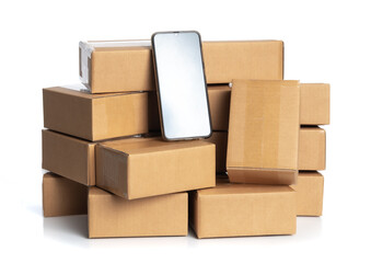 Stack of cardboard boxes for delivery with smartphone isolated on white,Online order, tracking and delivery concept