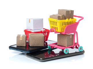 Online shopping concept;Smart phone with shopping cart or shopping basket and small boxes inside on white background