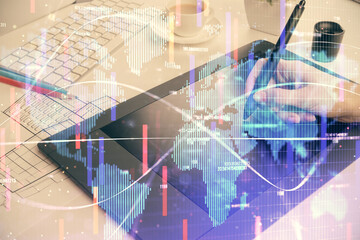 Double exposure of business theme sketch hologram and woman holding and using a mobile device.