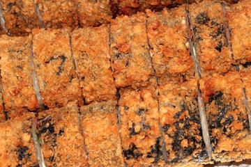 Hot sushi in nori leaves. Japanese food. Sushi in breaded fried.