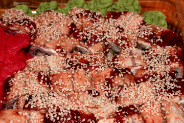 Hot sushi with eel and sesame. Japanese food. Wasabi ginger and baked sushi.