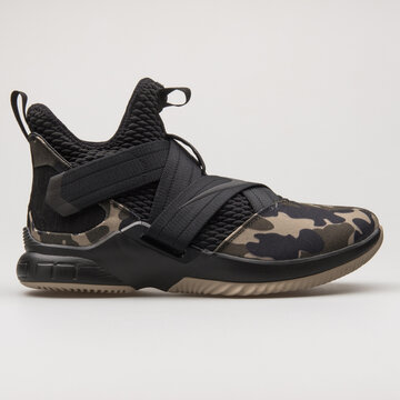 VIENNA, AUSTRIA - FEBRUARY 19, 2018: Nike Lebron Soldier 12 SFG black and camouflage sneaker on white background.
