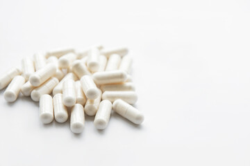 Fototapeta na wymiar Herb capsules on a white background
