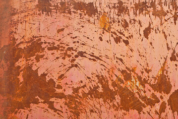 Texture of an old metal fence. Scratched metal sheet with red paint.