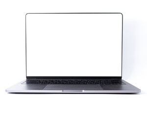 Fototapeta premium Front view blank monitor screen of a modern laptop with the mockup, aluminum body material, isolated on white background. Clipping path, technology and website system concept