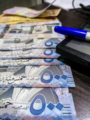 five hundreds latest style of Saudi currency notes in a raw 