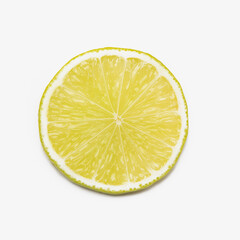 fresh lemon slice over white
