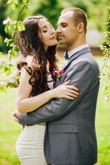 Gentle portrait of a young couple embracing each other in the park