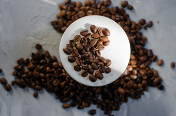 cosmetic jar with coffee beans on background