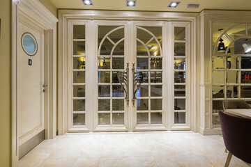 Entrance door in modern hotel restaurant