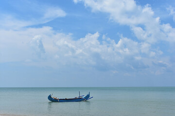 Boat on the ocean. Tanjung Tinggi Beach, Belitung, Bangka Belitung island, Indonesia
