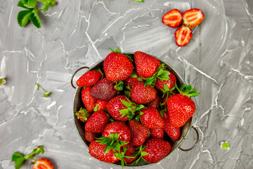 Strawberries in grey bowl. Fresh strawberries. Beautiful strawberries.