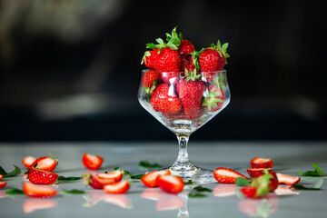 glass bowl with fresh strawberries isolated. Strawberry juice.  