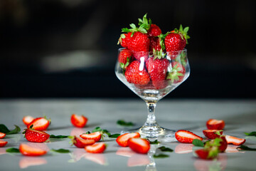 glass bowl with fresh strawberries isolated. Strawberry juice.  