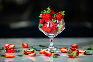 glass bowl with fresh strawberries isolated. Strawberry juice.  