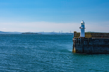 burntisland harbour lighthouse with views accross the firth of forth, fife, scotland.