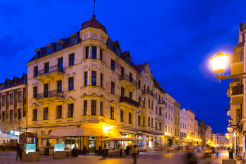 Fototapeta na wymiar Torun city historical streets and building at evening in Poland