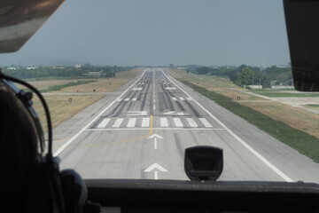 Pilot fly the aircraft passing final approach point. He aims to runway center line. 