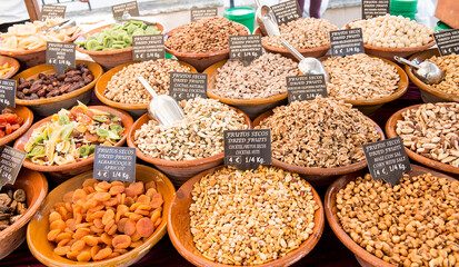 Selection of dried fruits and nuts for sale at Sineu market, Mallorca, Spain.