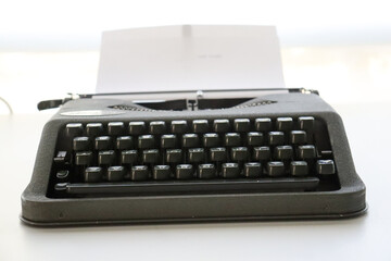 old typewriter with paper