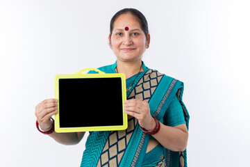 Indian woman holding a blank billboard