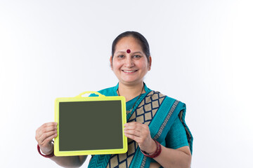 Indian woman holding a blank billboard