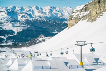 Aerial drone view of Madonna di Campiglio and ursus snowpark in Val Rendena dolomites Italy