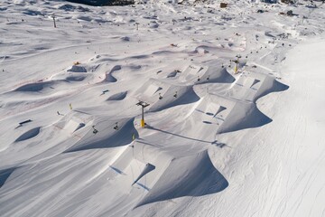 Aerial drone view of Madonna di Campiglio and ursus snowpark in Val Rendena dolomites Italy