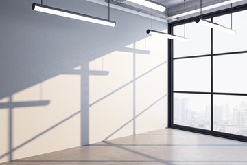 Modern office hall with blank wall and panoramic city view.