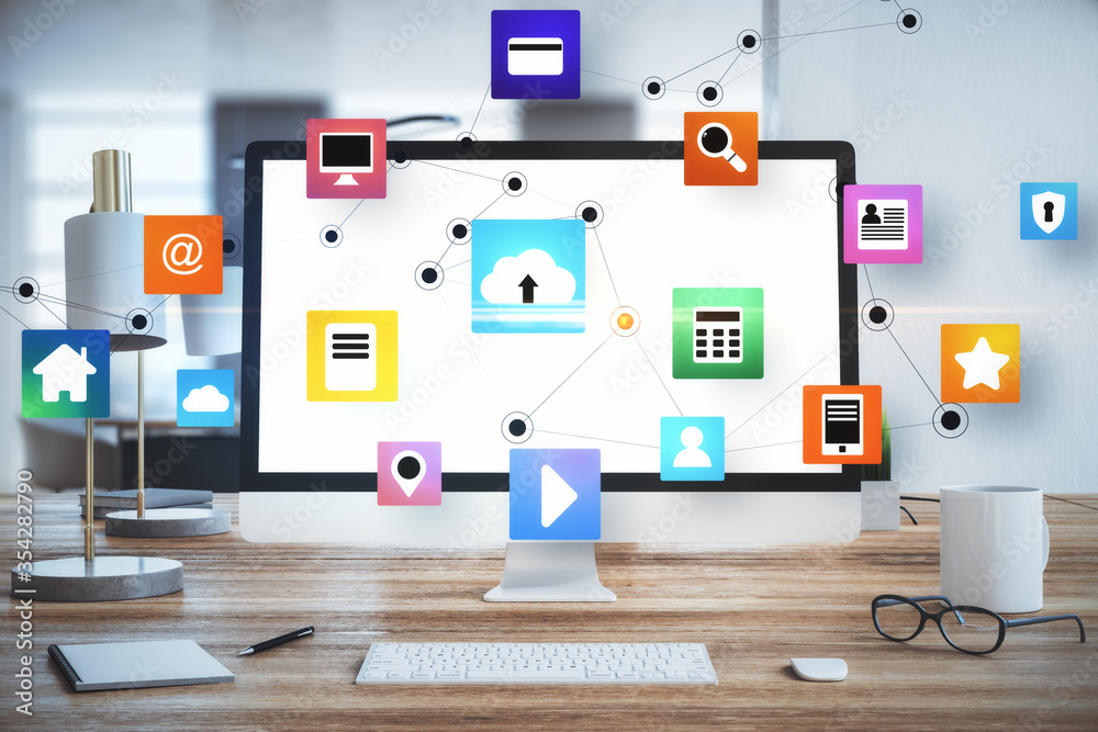 Aufkleber Computer on office table with online networking cloud diagram.