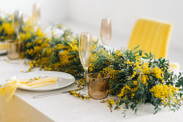 Mimosa flower dinner table set up