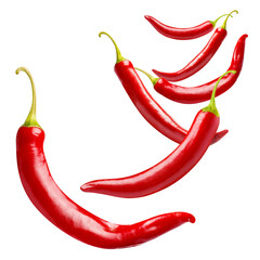 Flying delicious red chili peppers, isolated on white background